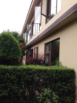 都江堰飞龙人文酒店预订价格,联系电话\位置地